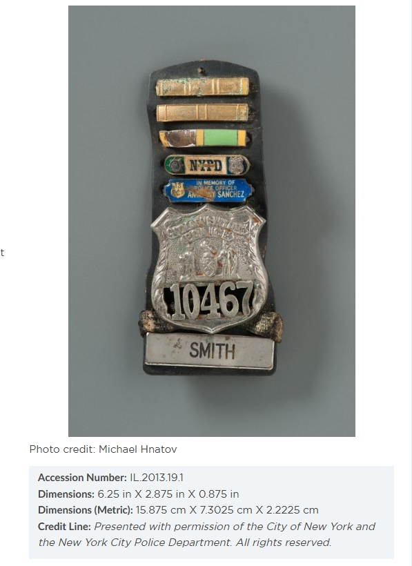 NYPD Shield No. 10467 — Badge of Police Officer Moira Ann Smith, recovered from Ground Zero, on display at the National September 11 Memorial Museum