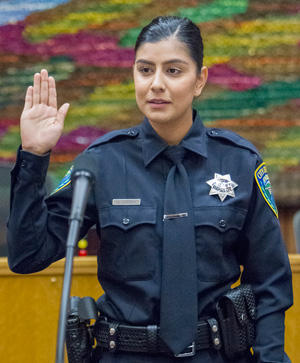 Officer Natalie Corona, Davis Police Department, taking her oath of office — Badge No. 224