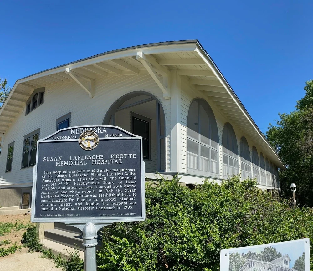 The Dr. Susan La Flesche Picotte Memorial Hospital, Walthill, Nebraska — built 1912, National Historic Landmark 1993, with Nebraska State Historical Society marker in foreground